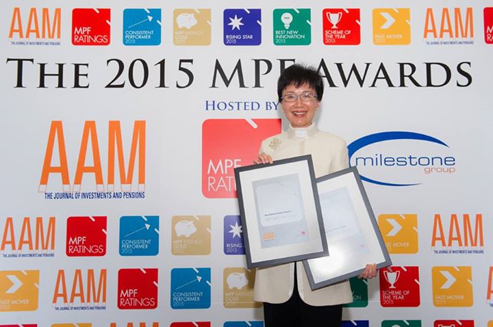 Ms Ka Shi Lau, BBS, Managing Director & CEO of BCT, receives awards on the stage.